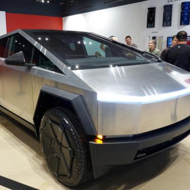 Tesla Shares Drop by 12% Following Q4 Earnings Miss and Slower 2024 Production Forecast